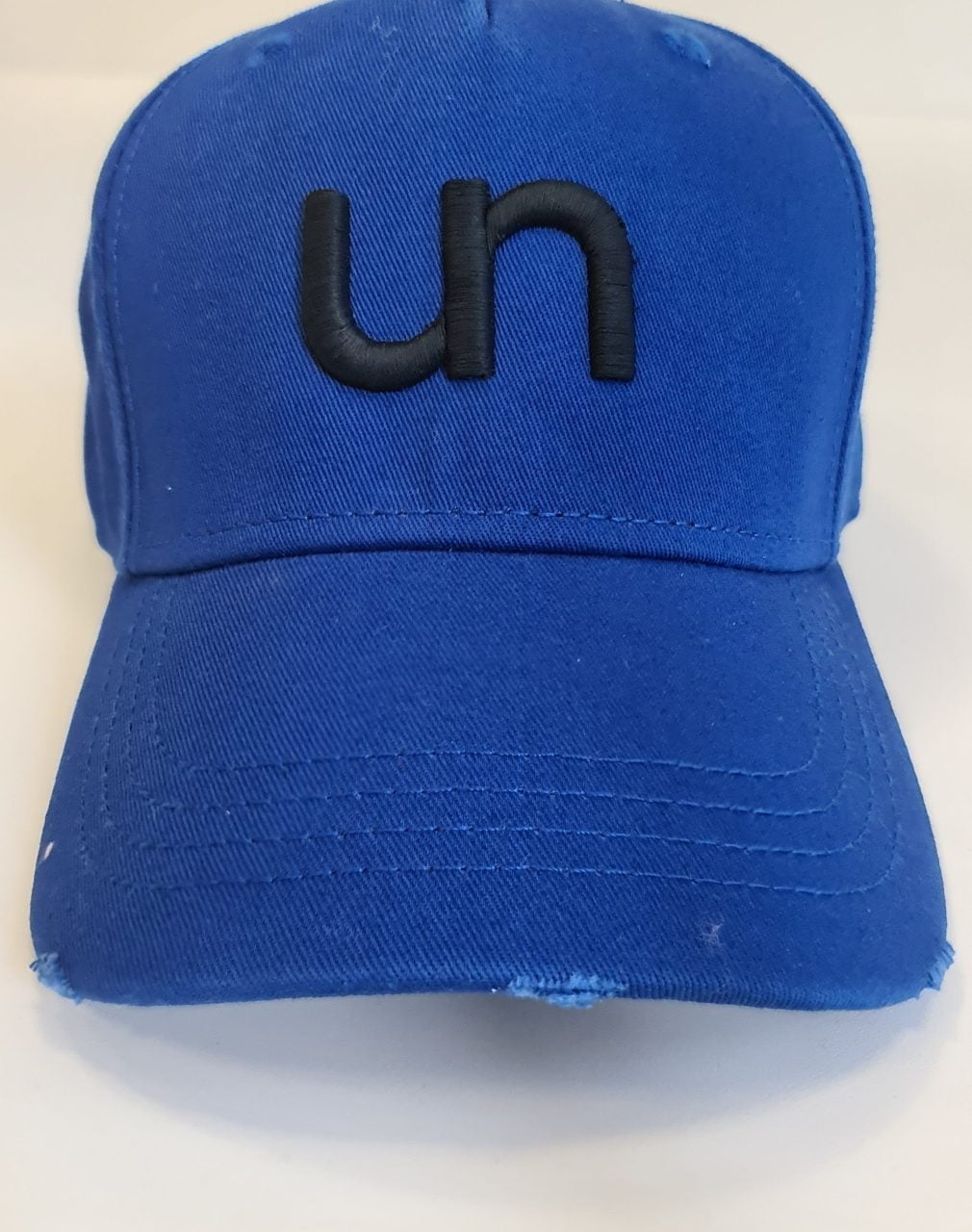 mėlyna unlabel kepurė