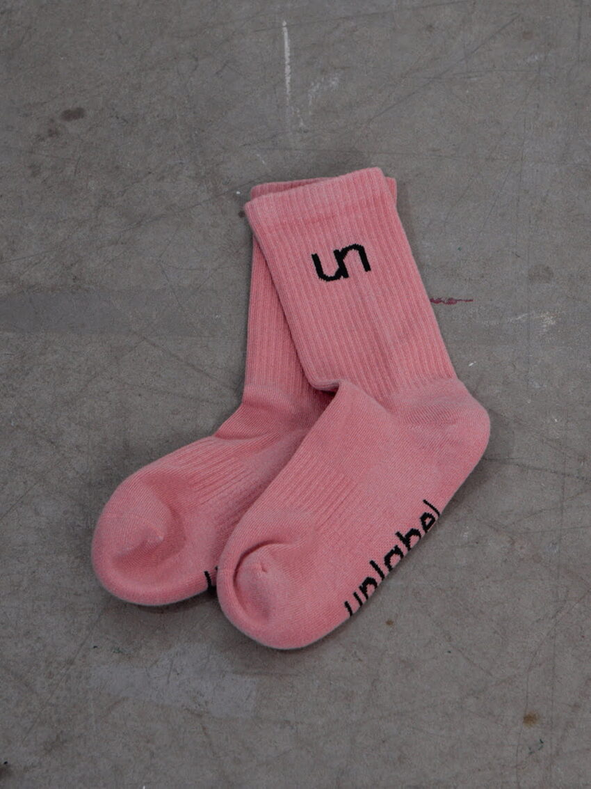 pink sport socks with logo | unlabel clothing. sporty soft crew  socks with logo on sole and calf