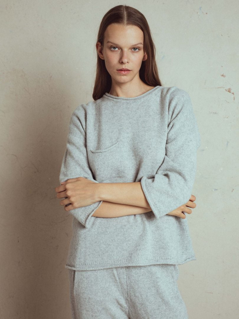 light grey sweater david. midweight, loose boxy fit sweater, round neck, 4/5 length sleeves with small pocket on chest, italian yarn.