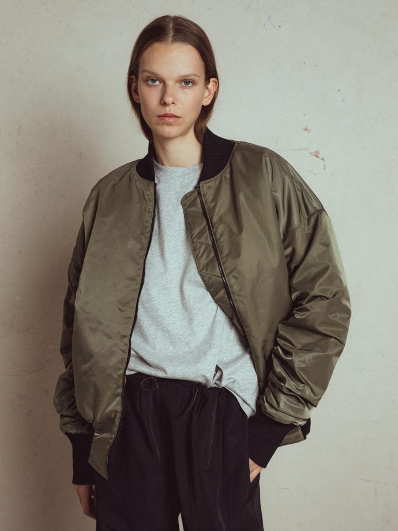 oversize bomber jacket miu, front zipper  fastening, below hip length, two front pockets, neck, cuffs and bottom is from knitted jersey fabric.