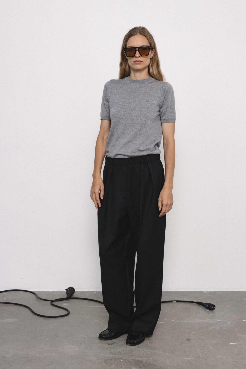 Women's clothing fashion. Anna pants from unlabel f/w 25'26 collection. Minimalist style, modern design, premium quality womenswear. Made in Lithuania.