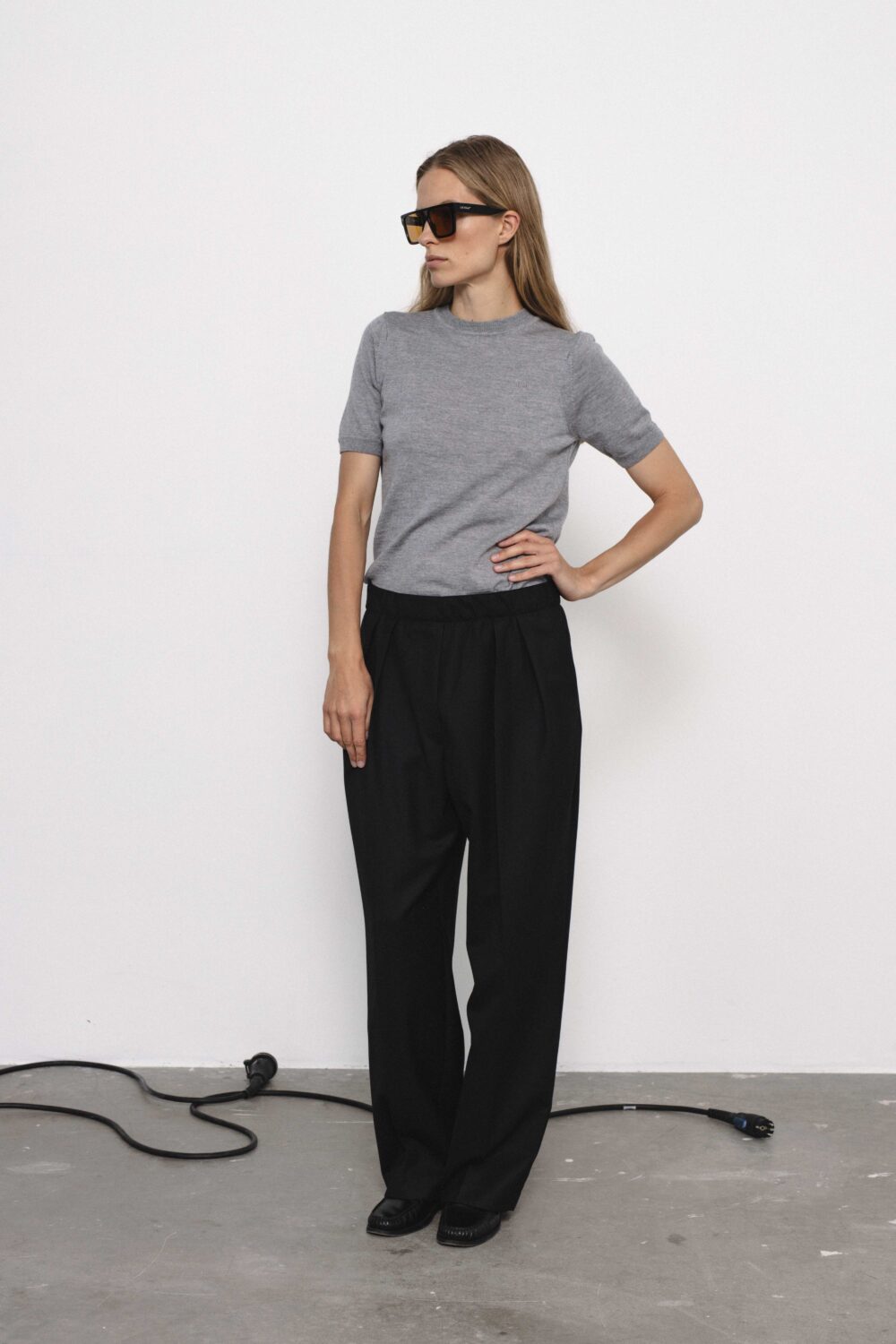 Women's clothing fashion. Anna pants from unlabel f/w 25'26 collection. Minimalist style, modern design, premium quality womenswear. Made in Lithuania.
