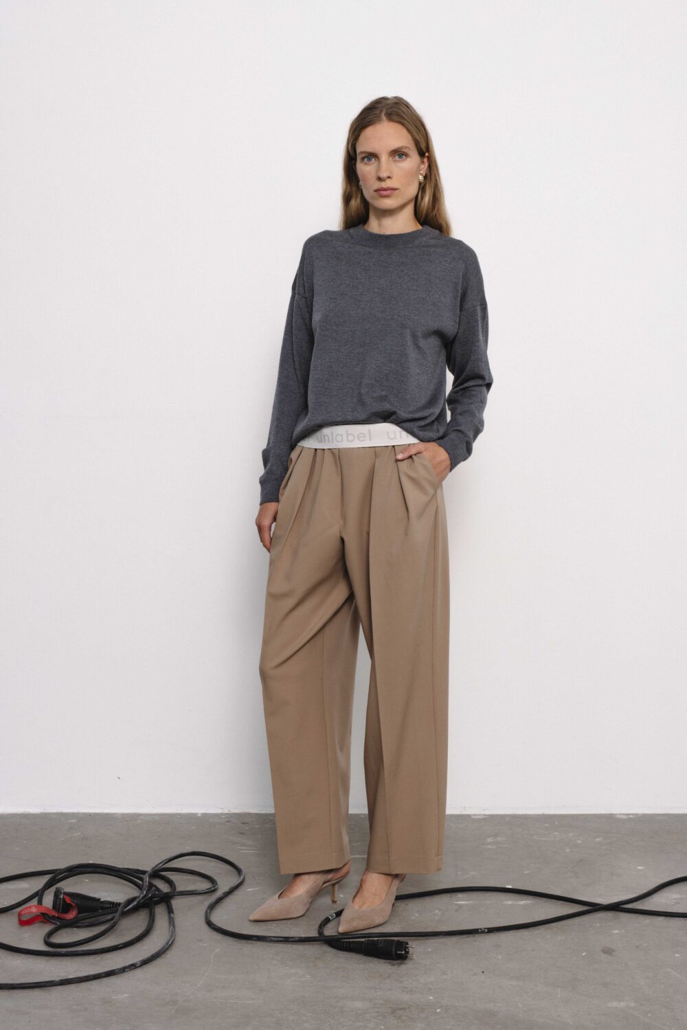 Women's clothing fashion. Anna1 pants from unlabel f/w 25'26 collection. Minimalist style, modern design, premium quality womenswear. Made in Lithuania.