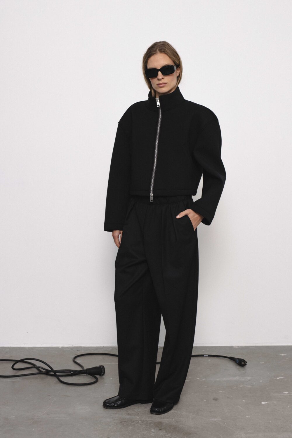 Women's clothing fashion. Dot jacket from unlabel f/w 25'26 collection. Minimalist style, modern design, premium quality womenswear. Made in Lithuania.