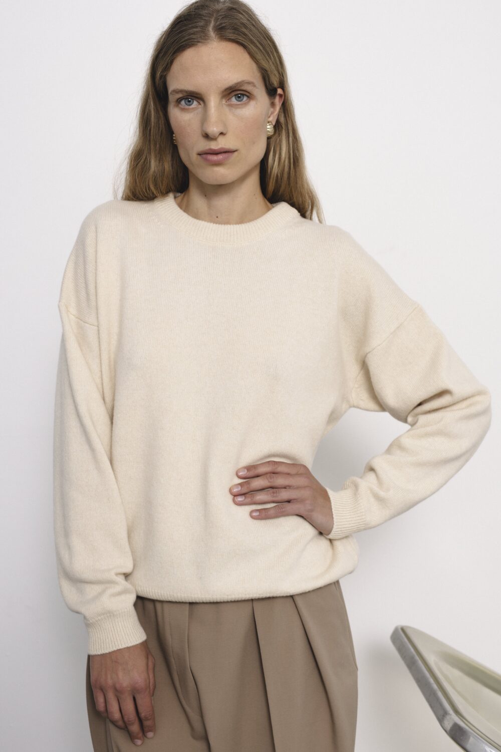 Women's clothing fashion. Hana1 sweater min from unlabel f/w 25'26 collection. Minimalist style, modern design, premium quality womenswear. Made in Lithuania.