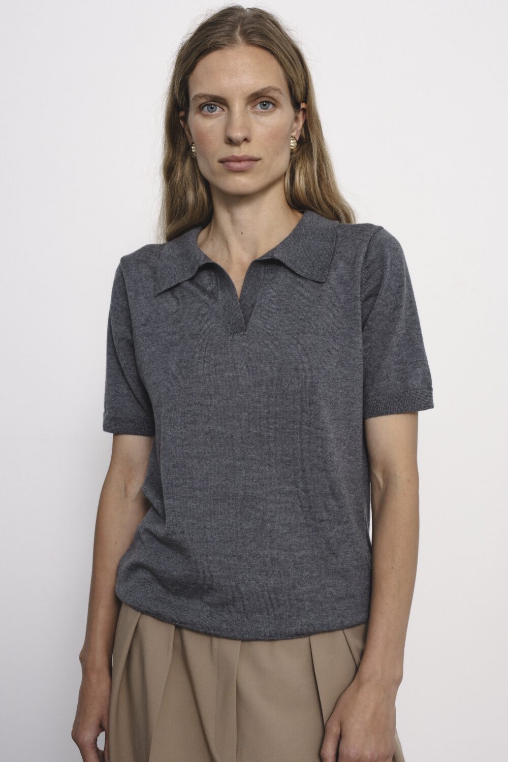 Women's clothing fashion. Nora4 top mid grey from unlabel f/w 25'26 collection. Minimalist style, modern design, premium quality womenswear. Made in Lithuania.