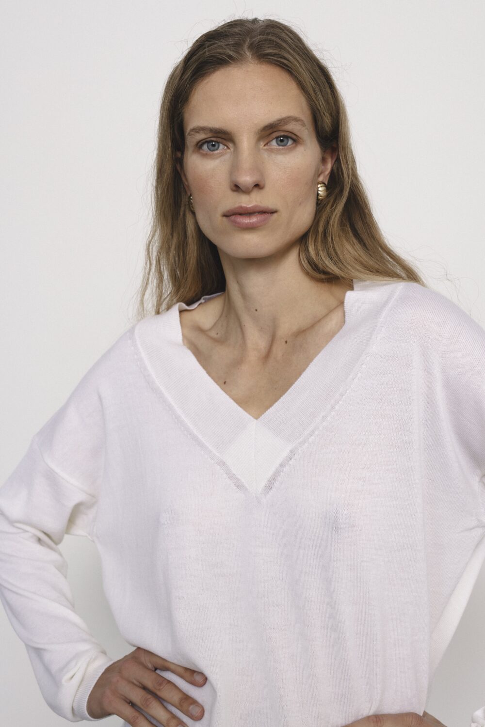 Women's clothing fashion. Sarah sweater from unlabel f/w 25'26 collection. Minimalist style, modern design, premium quality womenswear. Made in Lithuania.