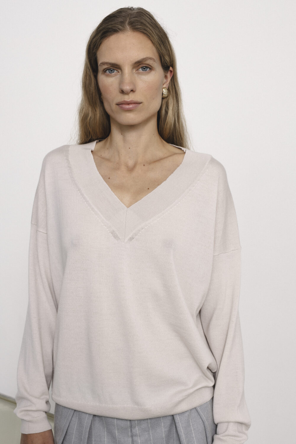 Women's clothing fashion. Sarah2 sweater from unlabel f/w 25'26 collection. Minimalist style, modern design, premium quality womenswear. Made in Lithuania.