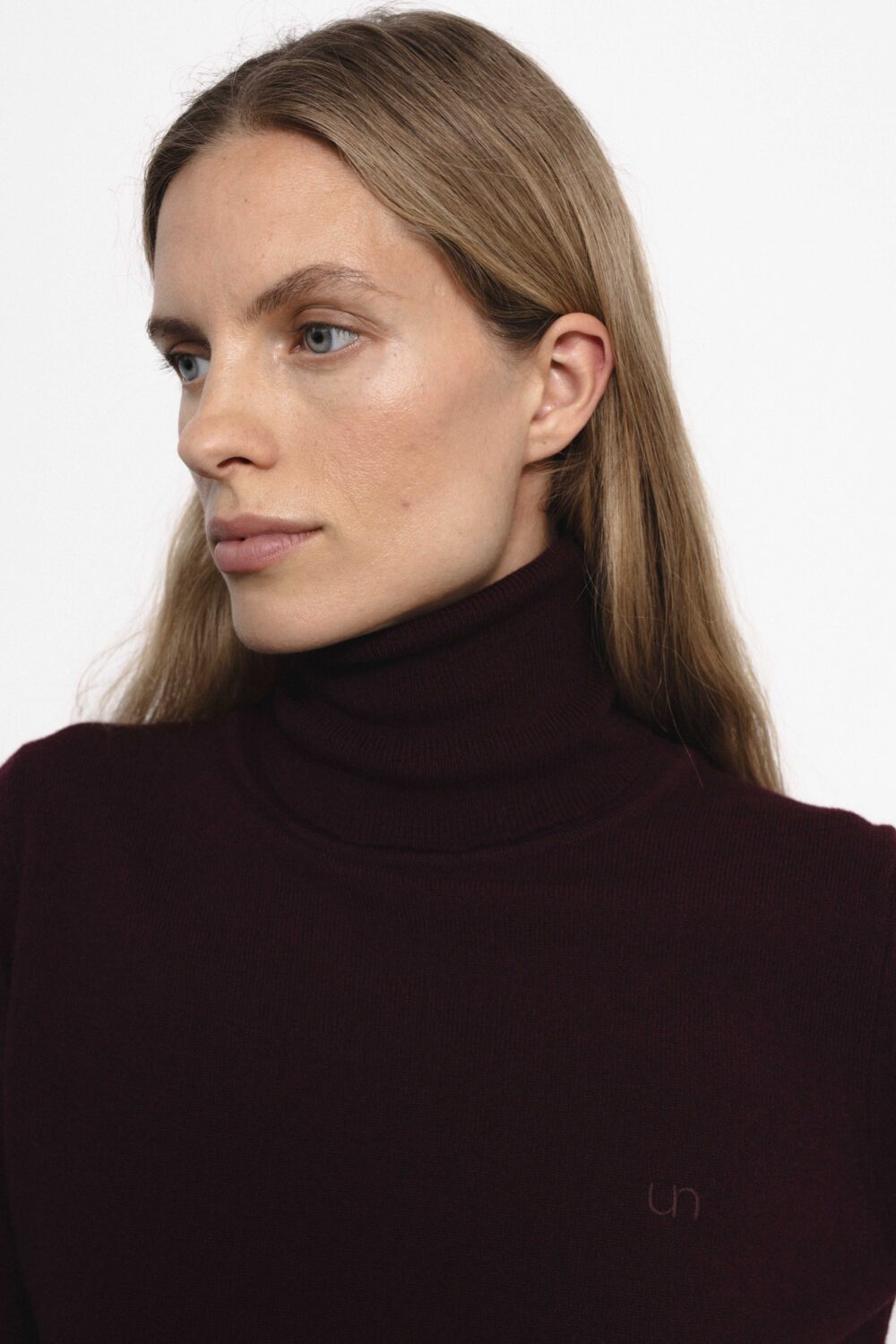 Women's clothing fashion. Semeru highneck from unlabel f/w 25'26 collection. Minimalist style, modern design, premium quality womenswear. Made in Lithuania.