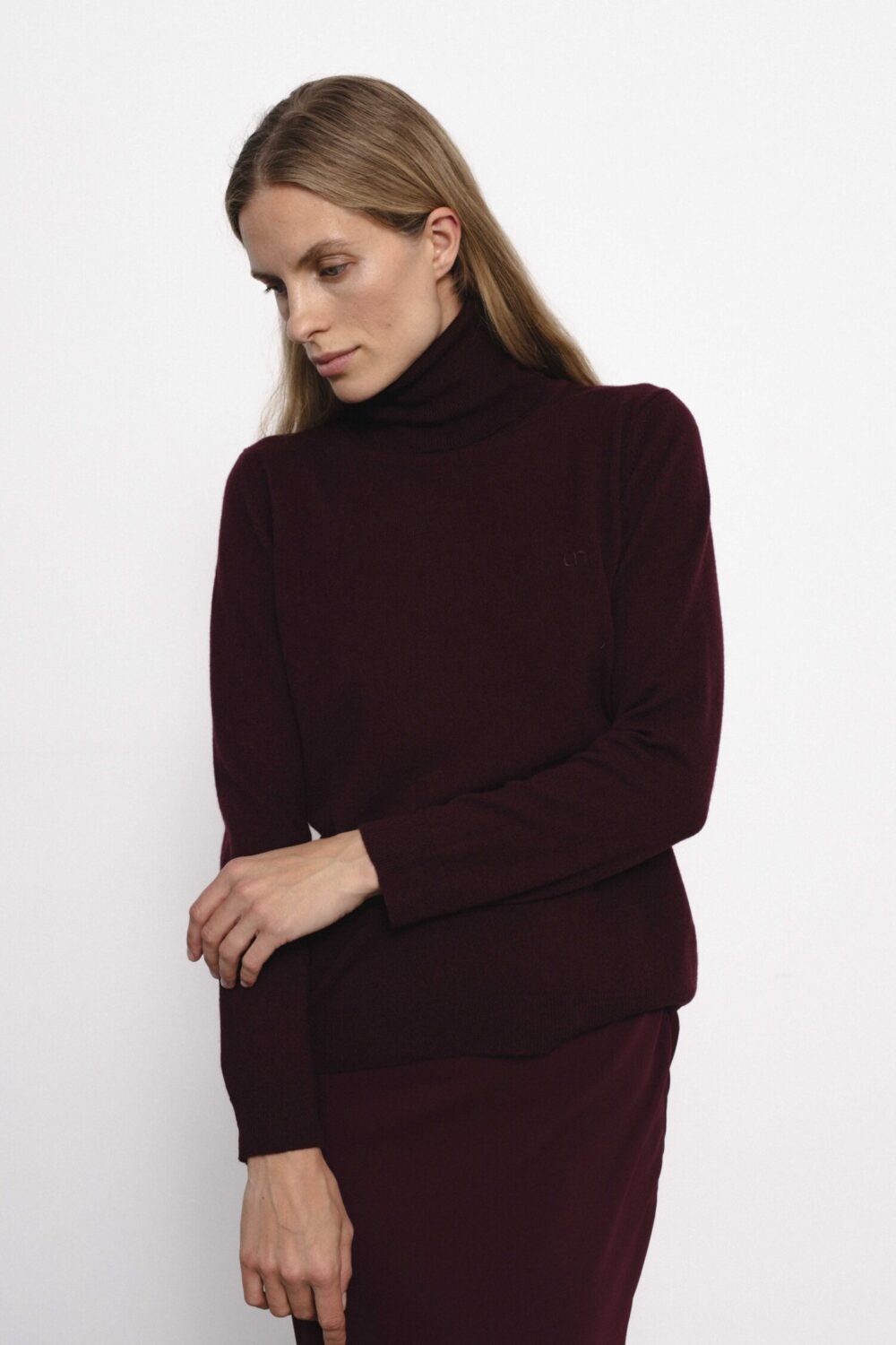 Women's clothing fashion. Semeru highneck 1566x2248 from unlabel f/w 25'26 collection. Minimalist style, modern design, premium quality womenswear. Made in Lithuania.