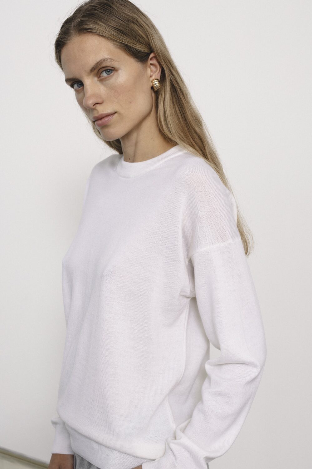 Women's clothing fashion. Viola sweater from unlabel f/w 25'26 collection. Minimalist style, modern design, premium quality womenswear. Made in Lithuania.