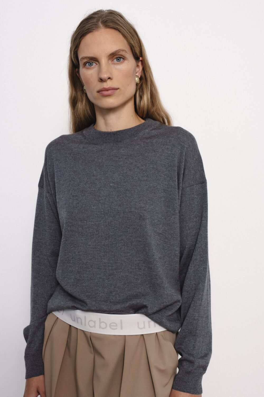 Women's clothing fashion. Viola4 sweater min from unlabel f/w 25'26 collection. Minimalist style, modern design, premium quality womenswear. Made in Lithuania.