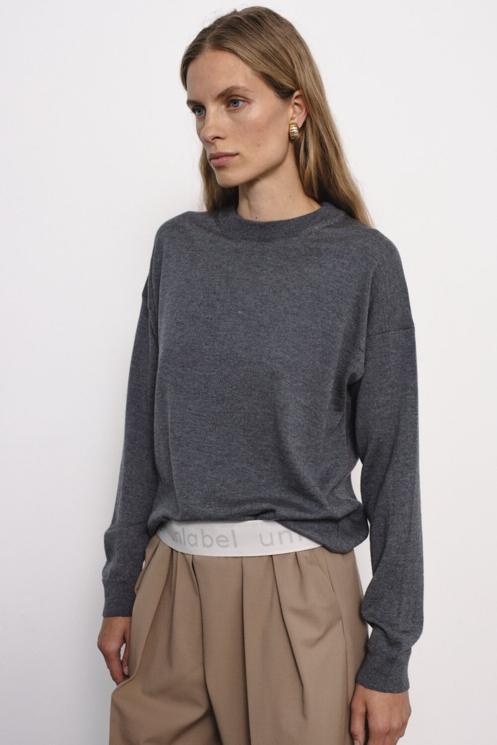Women's clothing fashion. Viola4 sweater min from unlabel f/w 25'26 collection. Minimalist style, modern design, premium quality womenswear. Made in Lithuania.