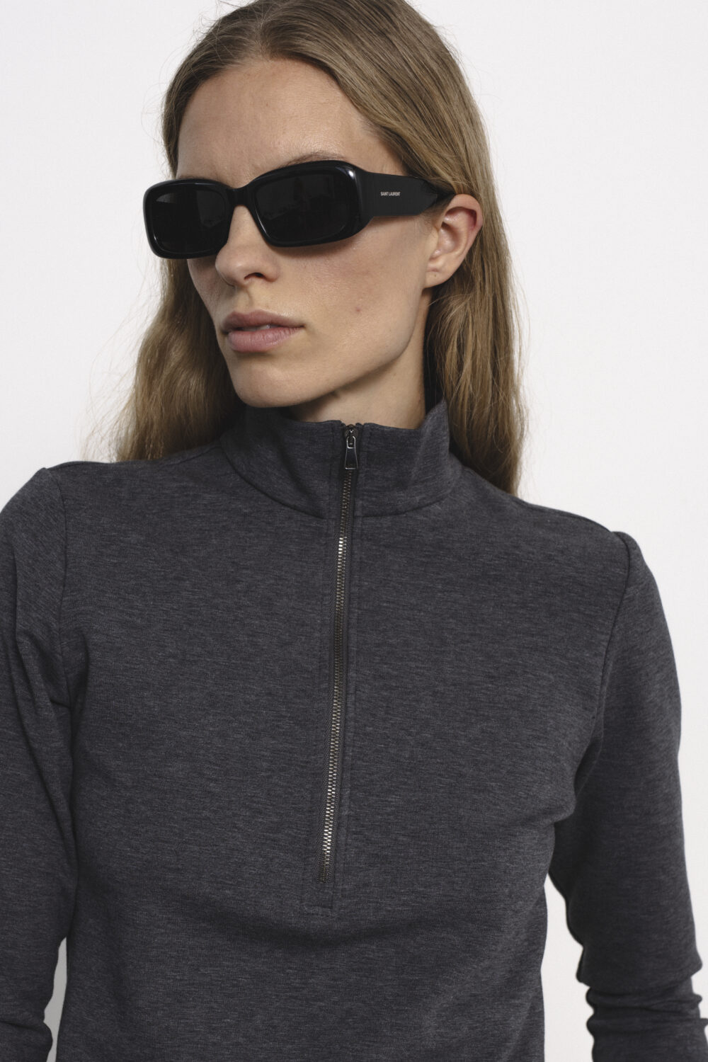Women's clothing fashion. Demi zip top from unlabel f/w 25'26 collection. Minimalist style, modern design, premium quality womenswear. Made in Lithuania.