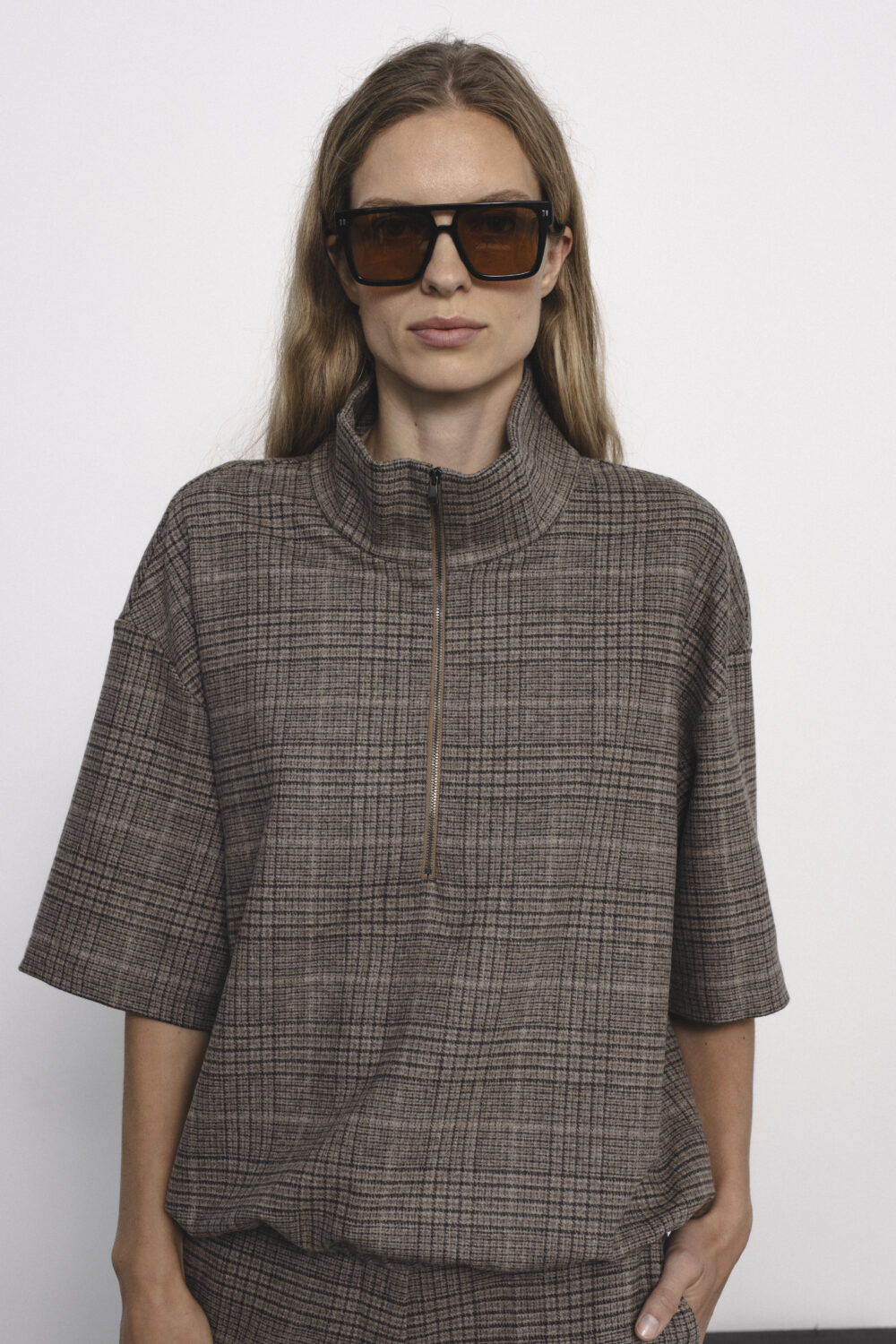 Women's clothing fashion. Lia top from unlabel f/w 25'26 collection. Minimalist style, modern design, premium quality womenswear. Made in Lithuania.