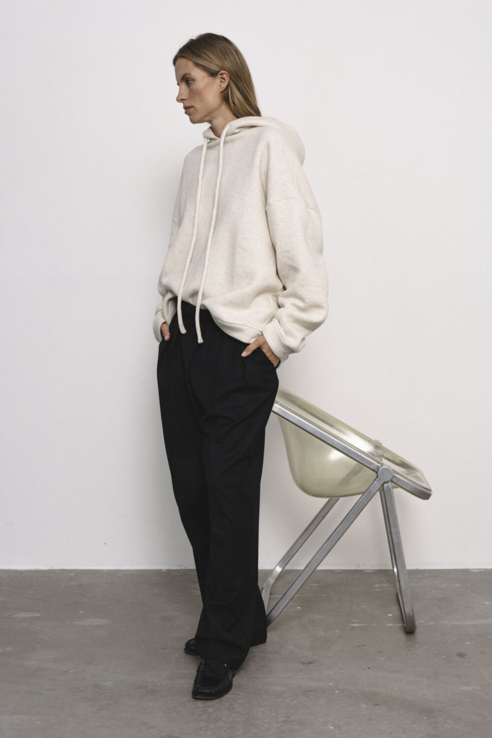 Women's clothing fashion. Sage hoodie from unlabel f/w 25'26 collection. Minimalist style, modern design, premium quality womenswear. Made in Lithuania.
