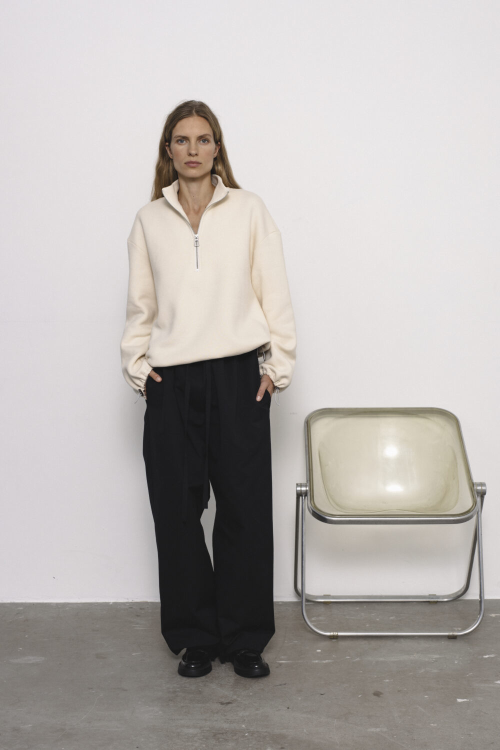Women's clothing fashion. Tess zip sweater from unlabel f/w 25'26 collection. Minimalist style, modern design, premium quality womenswear. Made in Lithuania.