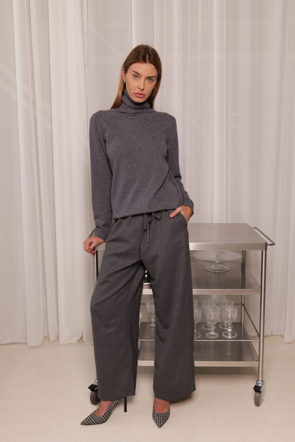 Women's clothing fashion. Lucy4 highneck from unlabel f/w 25'26 collection. Minimalist style, modern design, premium quality womenswear. Made in Lithuania.