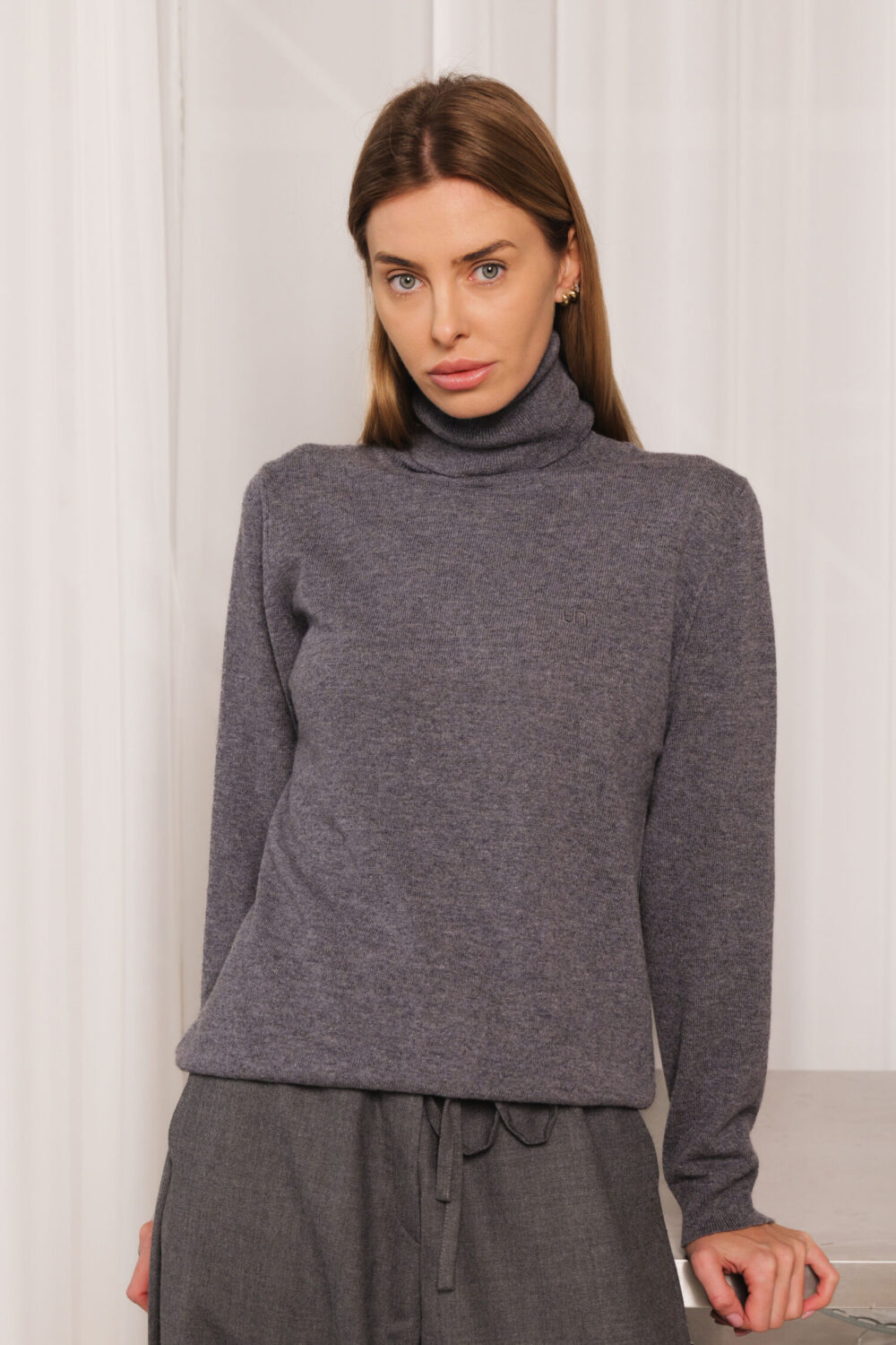 Women's clothing fashion. Lucy4 highneck from unlabel f/w 25'26 collection. Minimalist style, modern design, premium quality womenswear. Made in Lithuania.