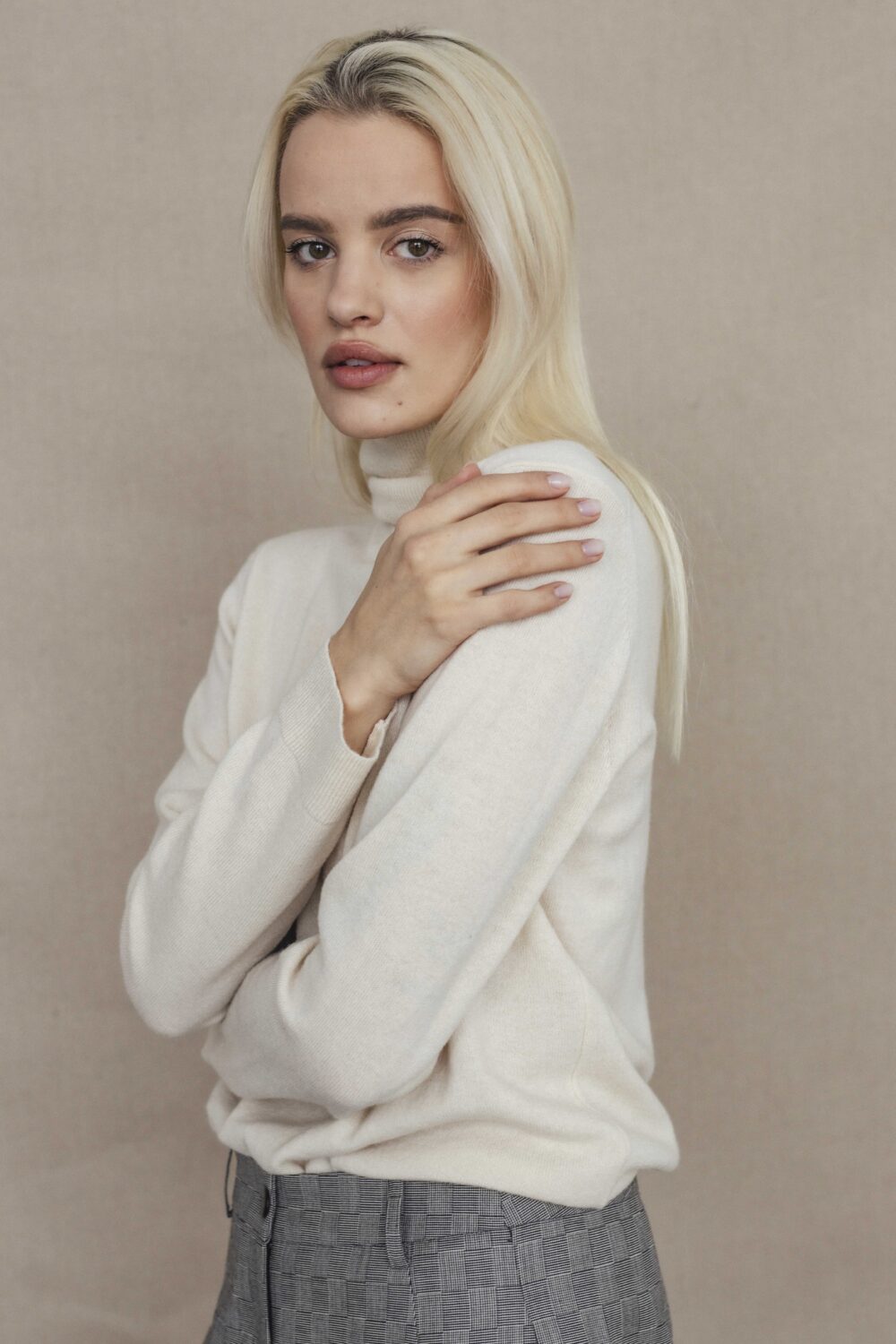 Women's clothing fashion. Lucy highneck from unlabel f/w 25'26 collection. Minimalist style, modern design, premium quality womenswear. Made in Lithuania.