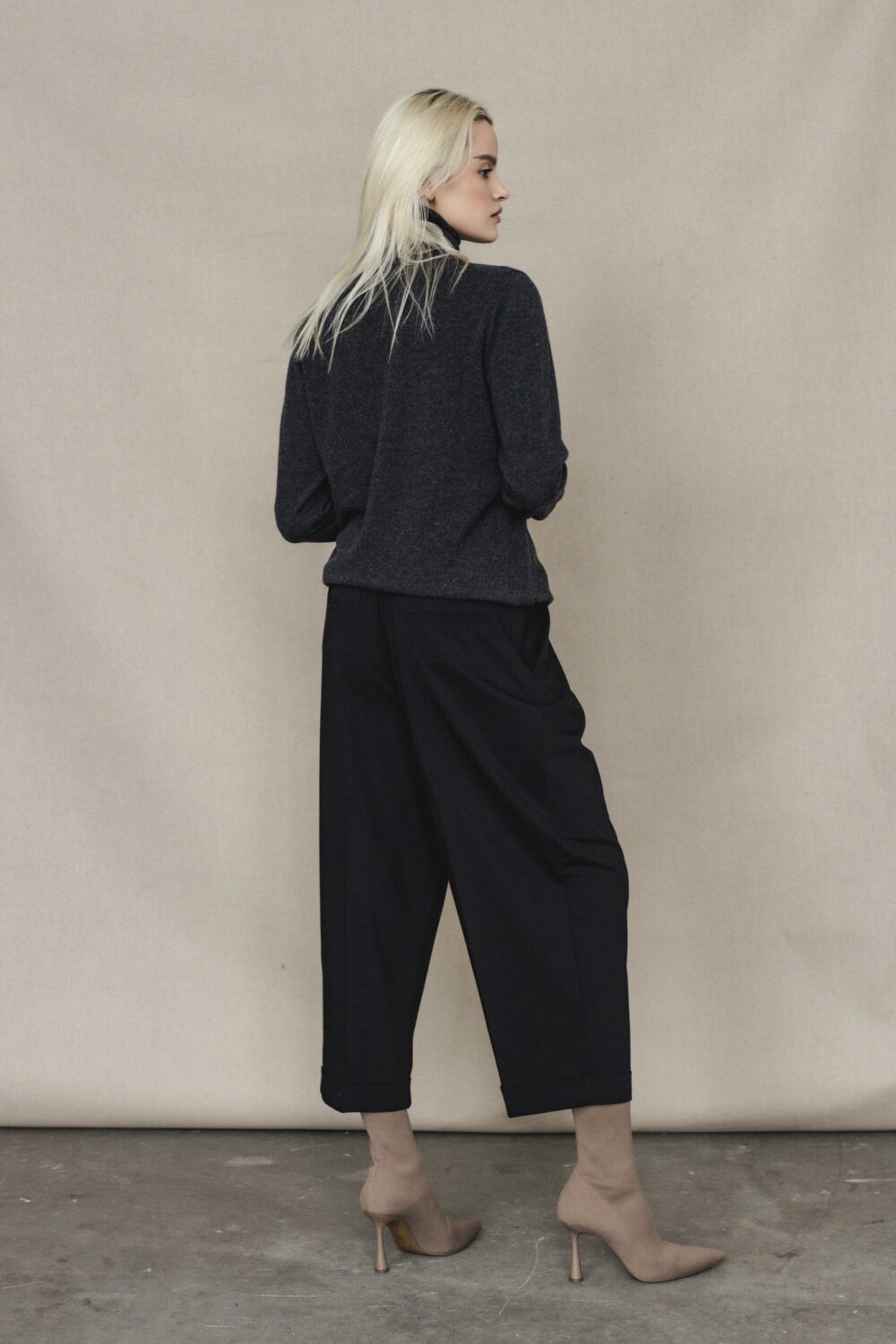 Women's clothing fashion. Lucy1 highneck from unlabel f/w 25'26 collection. Minimalist style, modern design, premium quality womenswear. Made in Lithuania.