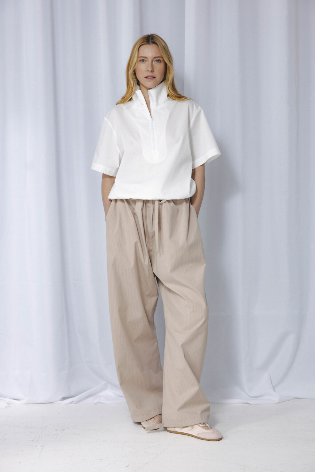Women's clothing fashion. Lola pants from unlabel f/w 25'26 collection. Minimalist style, modern design, premium quality womenswear. Made in Lithuania.
