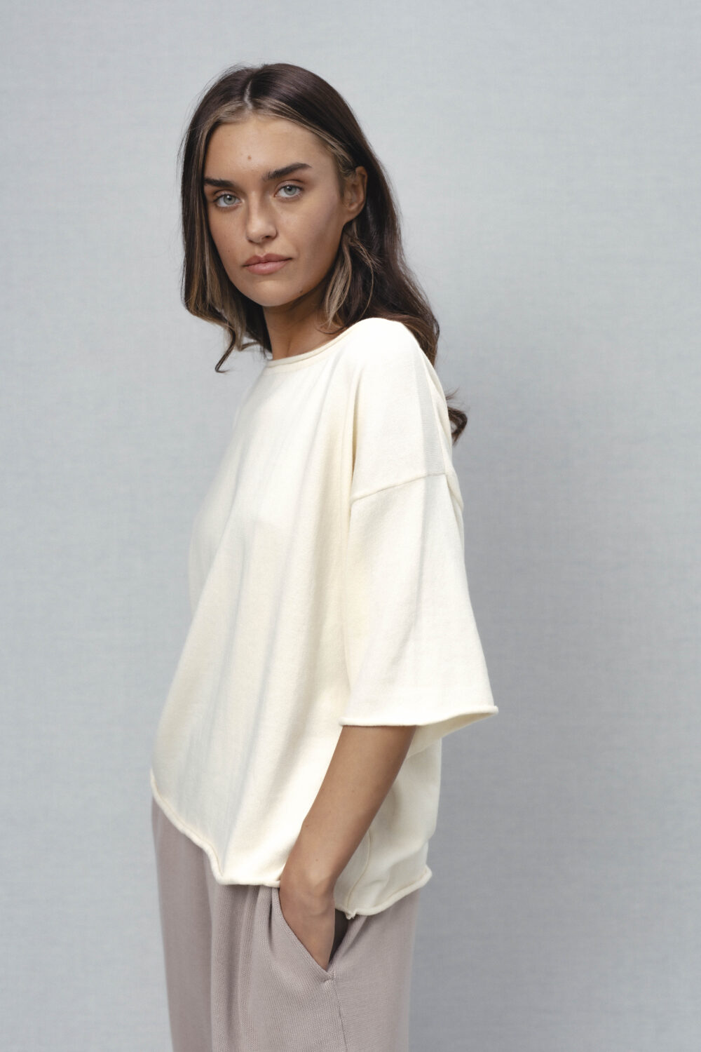 Women's clothing fashion. Lia1 solid top from unlabel ss/26 collection. Minimalist style, modern design, premium quality womenswear. Made in Lithuania.