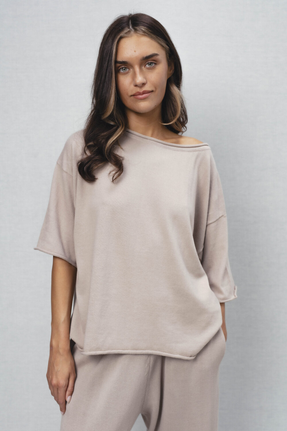 Women's clothing fashion. Lia2 solid top from unlabel ss/26 collection. Minimalist style, modern design, premium quality womenswear. Made in Lithuania.
