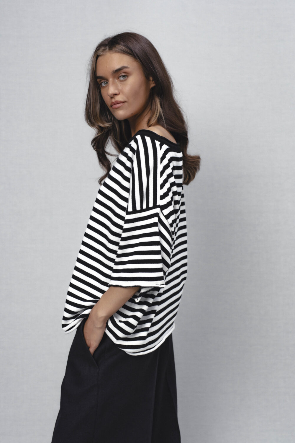 Women's clothing fashion. Myla1 striped top from unlabel ss/26 collection. Minimalist style, modern design, premium quality womenswear. Made in Lithuania.