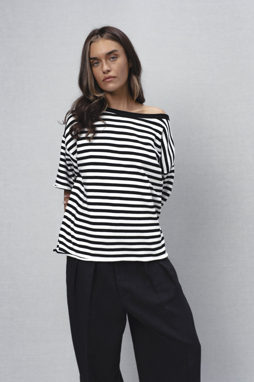 Women's clothing fashion. Myla1 striped top from unlabel ss/26 collection. Minimalist style, modern design, premium quality womenswear. Made in Lithuania.