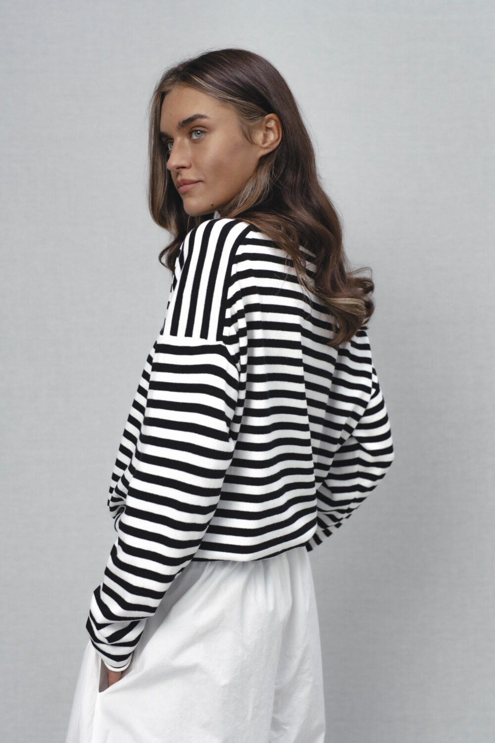 Women's clothing fashion. Nell1 sweater longsleeve stripes from unlabel ss/26 collection. Minimalist style, modern design, premium quality womenswear. Made in Lithuania.