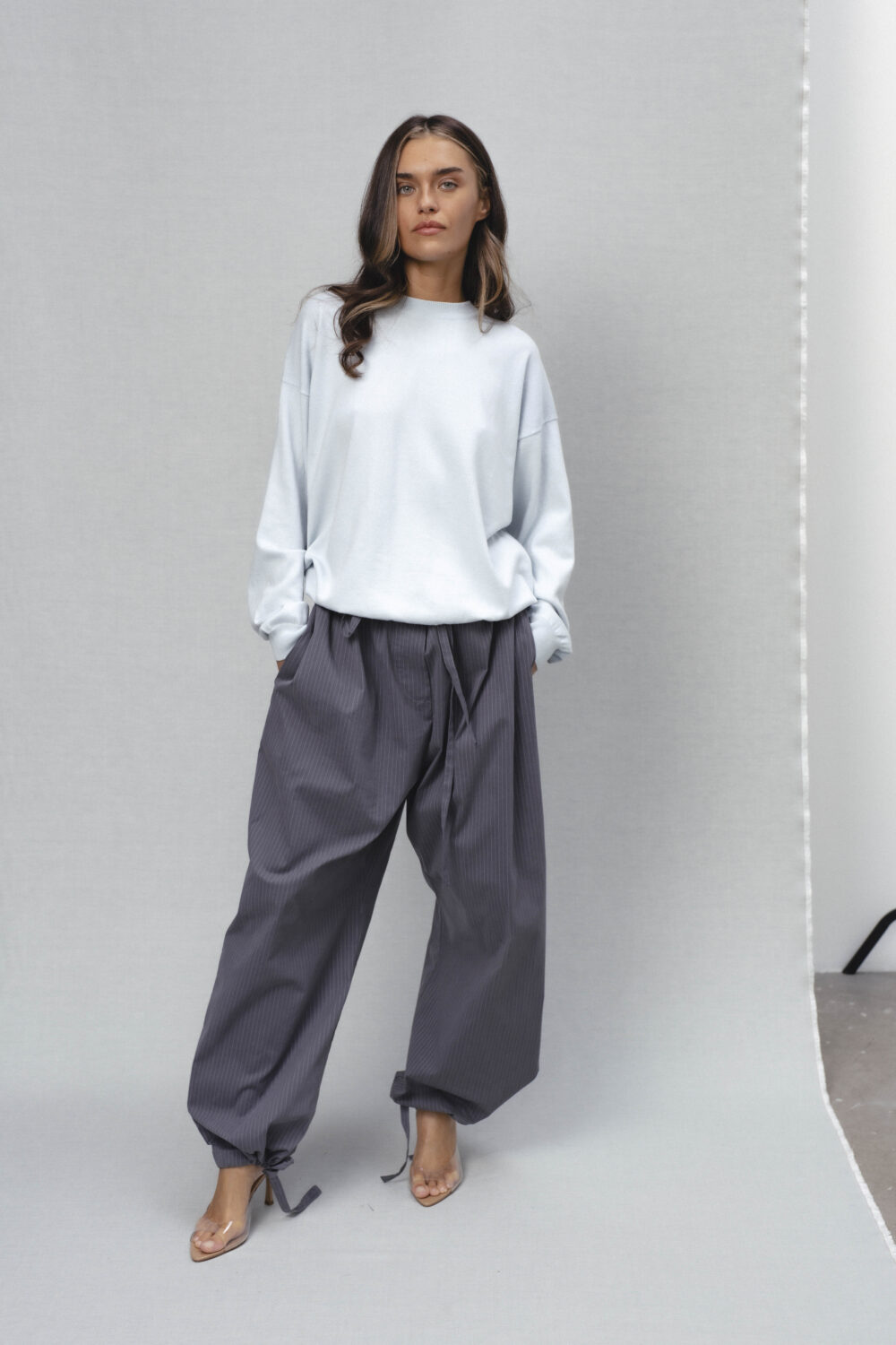 Women's clothing fashion. Rue2 sweater longsleeve from unlabel ss/26 collection. Minimalist style, modern design, premium quality womenswear. Made in Lithuania.