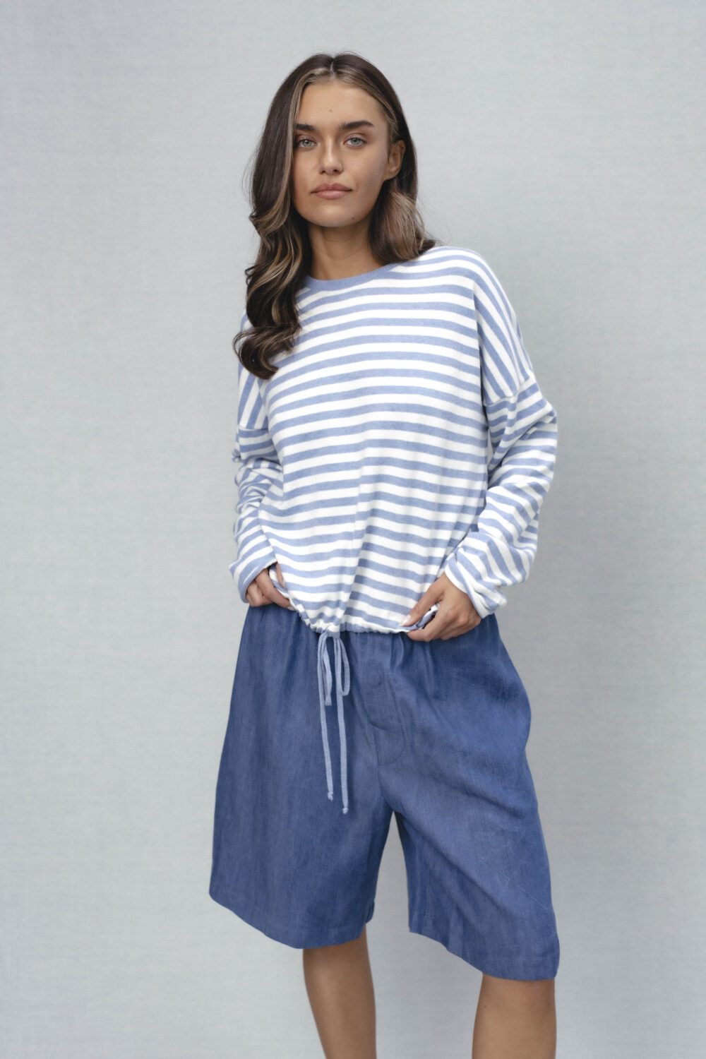 Women's clothing fashion. gleam1 shorts from unlabel ss/26 collection. Minimalist style, modern design, premium quality womenswear. Made in Lithuania.