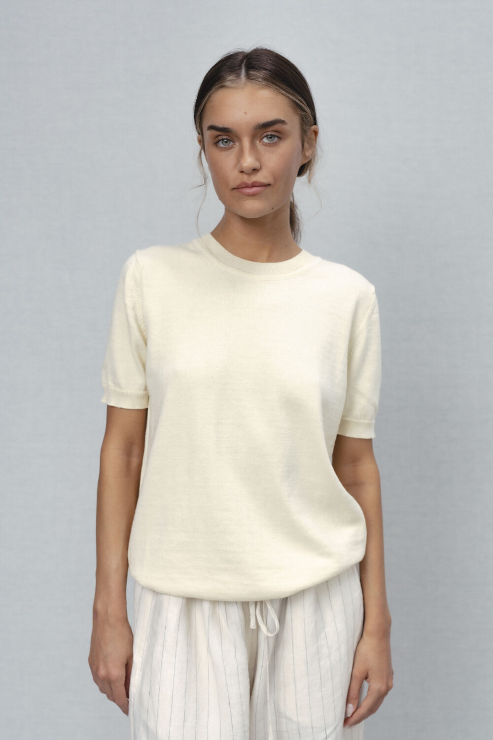 Women's clothing fashion. glint4 top from unlabel ss/26 collection. Minimalist style, modern design, premium quality womenswear. Made in Lithuania.