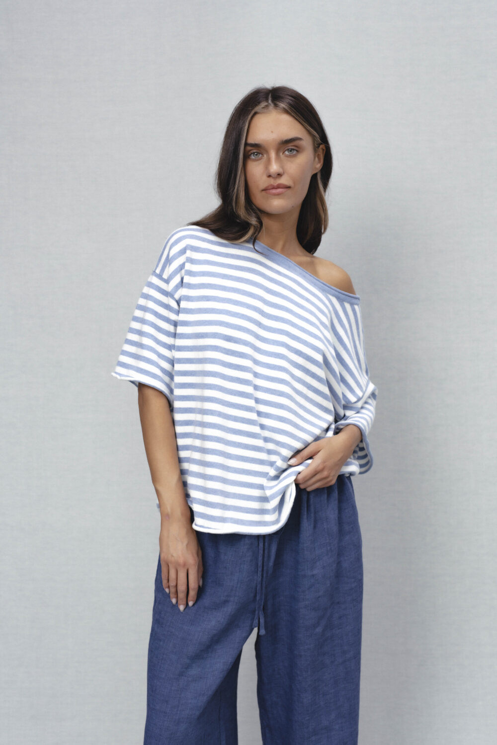 Women's clothing fashion. myla2 striped top from unlabel ss/26 collection. Minimalist style, modern design, premium quality womenswear. Made in Lithuania.