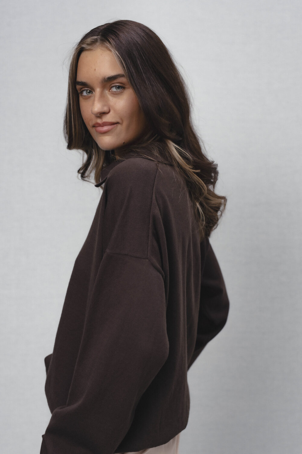 Women's clothing fashion. rose solid polosweater from unlabel ss/26 collection. Minimalist style, modern design, premium quality womenswear. Made in Lithuania.