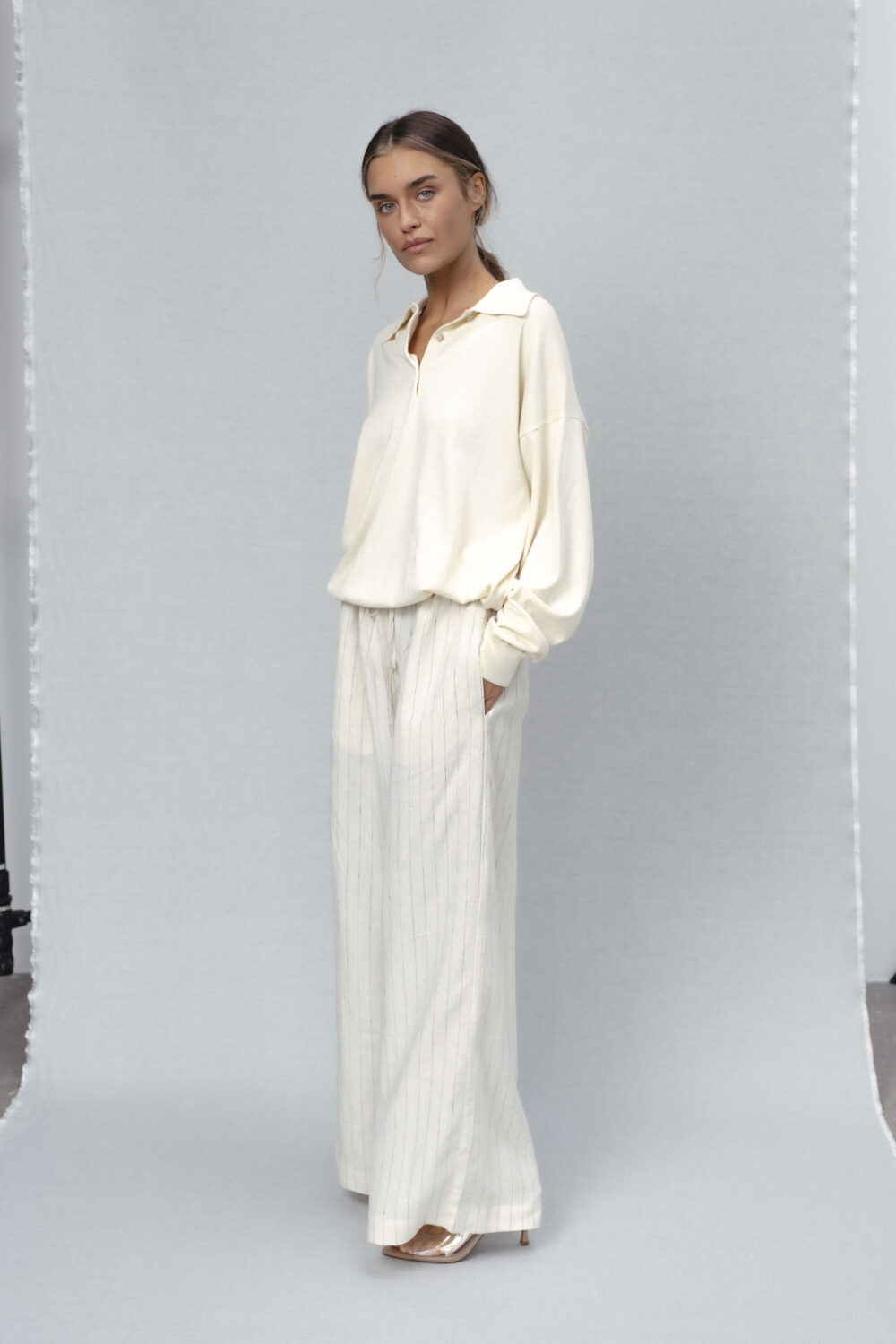 Women's clothing fashion. rose2 solid polosweater from unlabel ss/26 collection. Minimalist style, modern design, premium quality womenswear. Made in Lithuania.