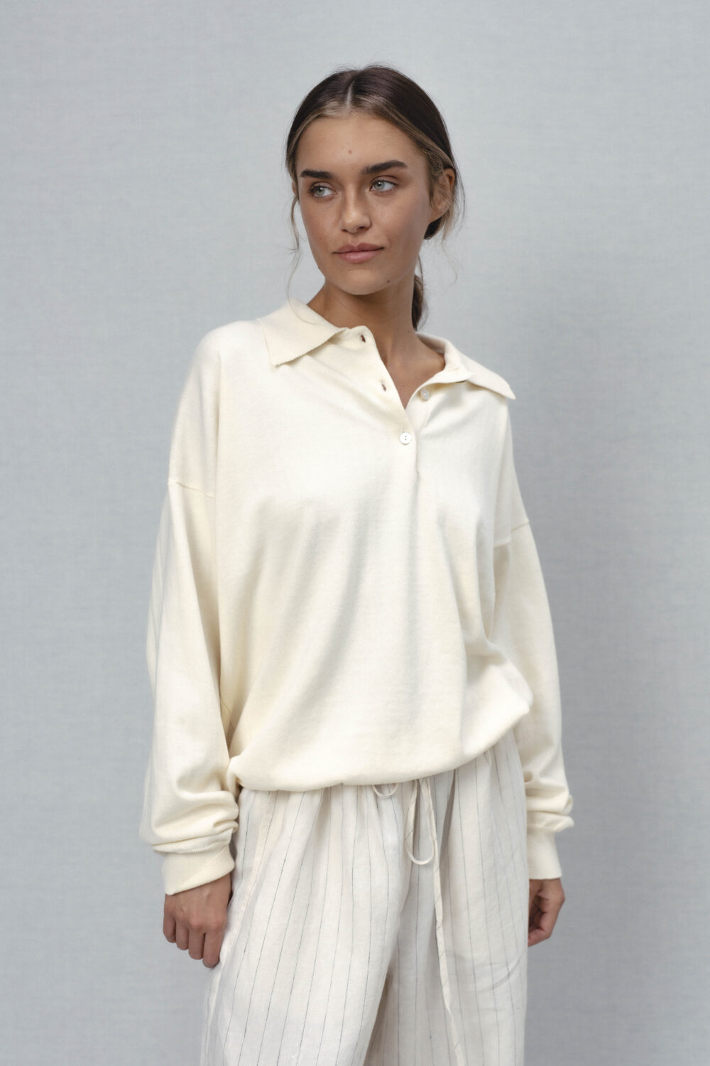 Women's clothing fashion. rose2 solid polosweater from unlabel ss/26 collection. Minimalist style, modern design, premium quality womenswear. Made in Lithuania.