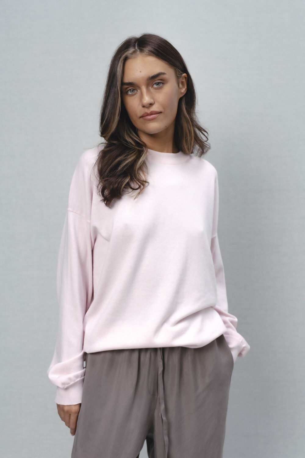 Women's clothing fashion. rue sweater longsleeve from unlabel ss/26 collection. Minimalist style, modern design, premium quality womenswear. Made in Lithuania.