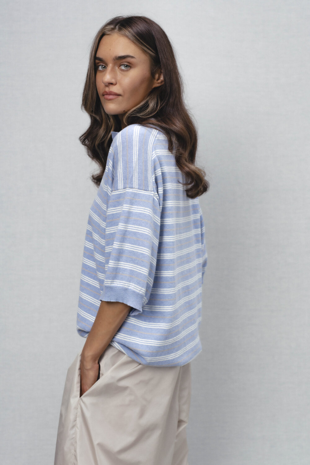 Women's clothing fashion. umbra polotop stiped from unlabel ss/26 collection. Minimalist style, modern design, premium quality womenswear. Made in Lithuania.